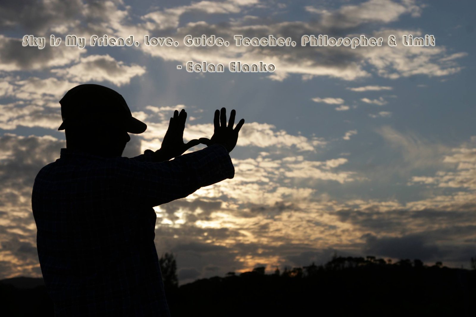 Filmmaker silhouette against the sky